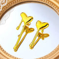 Golden Heart Statement Earrings